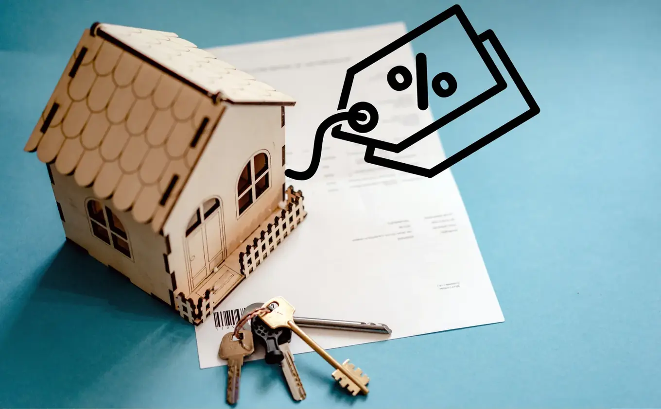 Modelwoning en procentteken als illustratie bij de onroerende voorheffing